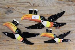 A SET OF THREE GUINNESS TOUCANS