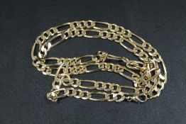 A YELLOW METAL NECKLACE WITH 9CT GOLD HALLMARKS TO CONNECTION LINK