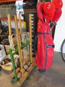 A GARDEN CROQUET SET TOGETHER WTIH VINTAGE GOLF CLUBS