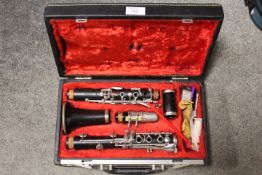 A CASED BUFFET CHAMPION & CIE A PARIS CLARINET