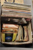 A BOX OF LP RECORDS AND 7