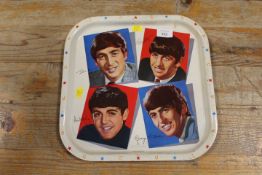 A VINTAGE BEATLES METAL TRAY