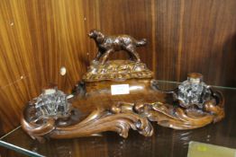 A LATE 19TH / EARLY 20TH CENTURY MAHOGANY DESK TIDY, with pair of inkwells and carved wooden lid