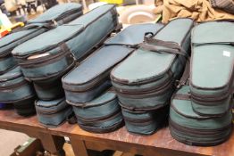 TWELVE ASSORTED CASED STUDENT TYPE VIOLINS - NOT CHECKED