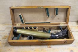 AN ANTI AIRCRAFT GUN SIGHT IN WOODEN CASE