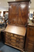 A GEORGIAN MAHOGANY BUREAU BOOKCASE. H 212 cm, W 101 cm