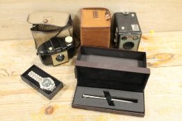 A CASED DUNHILL PEN WRISTWATCH AND TWO BOXED CAMERAS