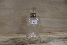 A HALLMARKED SILVER COLLARED GLUG GLUG DECANTER WITH REPLACEMENT STOPPER