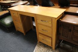 A MODERN LIGHT OAK TWIN PEDESTAL DESK W 147 CM