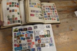THREE STAMP ALBUMS AND CONTENTS