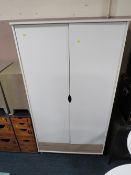 A MODERN WHITE DOUBLE WARDROBE