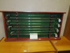 A SET OF EIGHT BEN HOGAN APEX 50 IRONS IN A FITTED OPEN DISPLAY CASE