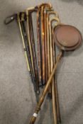 A COLLECTION OF WALKING STICKS ETC