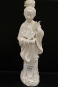 A BLANC DE CHINE FIGURE OF AN ORIENTAL LADY A/F