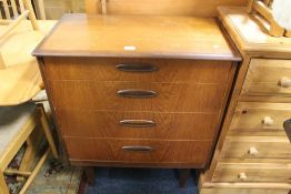 A VINTAGE TEAK FOUR DRAWER CHEST W 77 CM