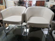 A PAIR OF MODERN UPHOLSTERED TUB STYLE CHAIRS