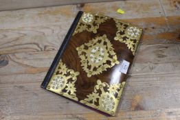 A 19TH CENTURY DECORATIVE WOODEN AND BRASS FOLDER
