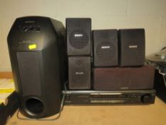 A SONY SAW10 SUBWOOFER WITH SONY TA-VE100 STEREO AMPLIFIER AND SPEAKERS