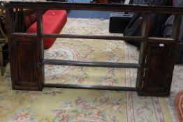 AN ANTIQUE OAK OPEN DRESSER RACK