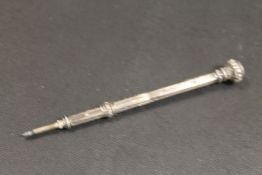 A VICTORIAN ENGRAVED SILVER EXTENDING PENCIL