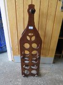 A MODERN WINE BOTTLE STAND