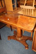 AN UNUSUAL ANTIQUE ADJUSTABLE WALNUT READING TABLE