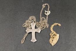 A BABYS I.D BRACELET STAMPED 375 TOGETHER WITH A STERLING SILVER CROSS PENDANT ON CHAIN