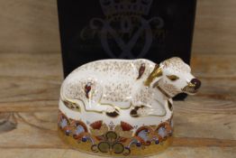 A ROYAL CROWN DERBY PAPERWEIGHT IN THE FORM OF A WATER BUFFALO - WITH BOX