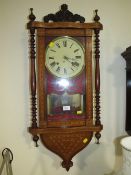 AN AMERICAN INLAID WALL CLOCK
