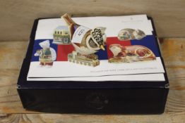 A ROYAL CROWN DERBY PAPERWEIGHT IN THE FORM OF A GOLD CRESTED TIT WITH BOX