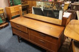 A VINTAGE TEAK 'HOMEWORTHY' DRESSING TABLE W 137 CM