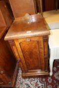 A VICTORIAN WALNUT POT CUPBOARD WITH CARVED DETAIL