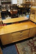 A VINTAGE 'AUSTINSUITE' TEAK DRESSING TABLE W-125 CM