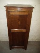 AN OAK MID CENTURY VANITY CUPBOARD