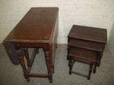 AN OAK DROPLEAF TABLE AND AN OAK NEST OF TABLES
