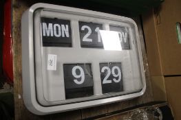 A WALL MOUNTED ELECTRONIC WALL CALENDAR