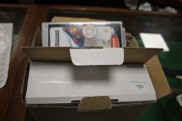 FOUR PLAYSTATION 2 GAMES AND ACCESSORIES