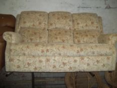 A FABRIC CHENILLE THREE SEATER SOFA