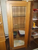 AN OAK GLASS DISPLAY CABINET