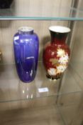 A PAIR OF VASES MAROON CROWN DEVON 22CMS AND BLUE DEVON LUSTRE