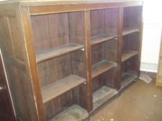 AN ANTIQUE LARGE BOOKSHELF - DOUBLE SIDED (STORAGE ROOM TO RIGHT OF PAYMENT OFFICE)