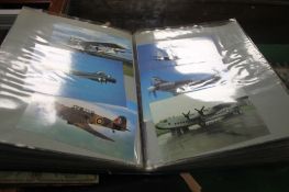 FOLDER OF A AEROPLANE PHOTOS AND A SMALL STAMP ALBUM