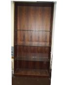 A LARGE GLASS SHELVED SHOP DISPLAY UNIT