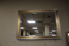 A LARGE MODERN MIRROR 106 X 76CM