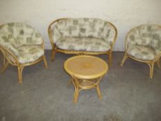 A BAMBOO FOUR PIECE CONSERVATORY SUITE TO INCLUDE A TABLE