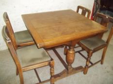 A 1920S DRAWLEAF TABLE AND 4 CHAIRS
