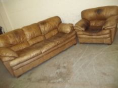 A LEATHER TWO PIECE SUITE