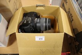 A SONY A330 CAMERA WITH 200M LENS AND INSTRUCTIONS