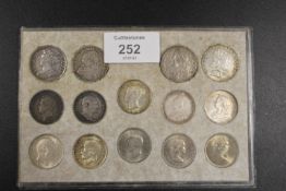 A SELECTION OF SHILLINGS DATING FROM QUEEN ANNE 1711 TO QUEAN ELIZABETH II 1969 (14 COINS IN TOTAL)