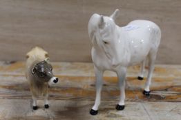 A ROYAL DOULTON MODEL OF A GREY MARE TOGETHER WITH A BESWICK JERSEY COW A/F